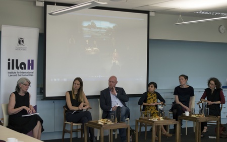 Minutes of Evidence researchers and partners presenting at Melbourne Law School, October 2014. 